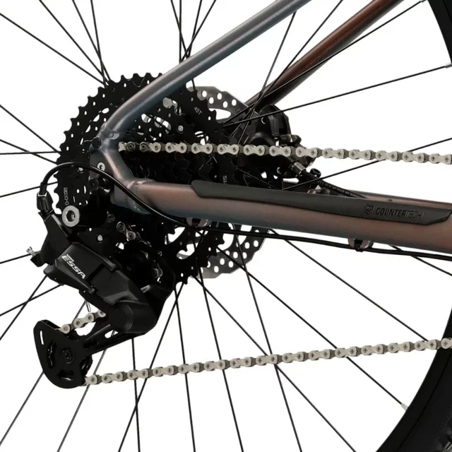 Hegyi kerékpár Kross Level X100  29"  2026, SR Suntour XCM 32 DS rugózó villa, Shimano MT200 hidraulikus tárcsafékek,  VELO Double Density markolatok - szürke / barna / matt