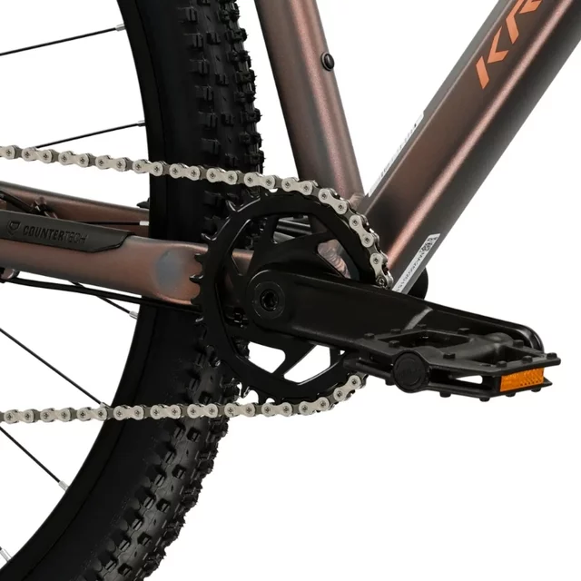 Hegyi kerékpár Kross Level X100  29"  2026, SR Suntour XCM 32 DS rugózó villa, Shimano MT200 hidraulikus tárcsafékek,  VELO Double Density markolatok - szürke / barna / matt