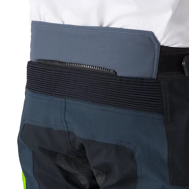 Motoros nadrág W-TEC Modock, víz- és szélálló, kivehető CE protektorok, Visionight fényvisszaverő elemek, csúszásgátló alkalmazás az ülőrészen - fekete-kék-fluoreszkáló sárga