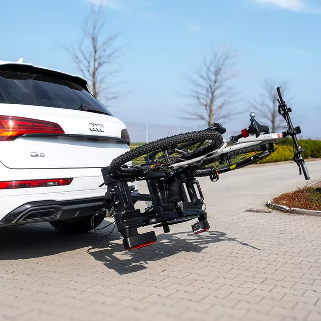 Vonóhorogra szerelhető kerékpártartó inSPORTline Trekan 2 Elektro - két kerékpárhoz, görgős szerkezet, billenthető mechanizmus