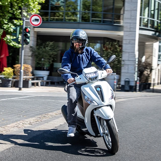 Bukósisak beépített fejhallgatóval SENA Outstar S matt fekete
