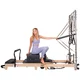 Pilates Reformer torony inSPORTline Driftaler, stabil szerkezet, 53 rögzítőszem, V-alakú fogantyú, négy hosszú és négy rövid prémium rugó