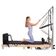 Pilates Reformer torony inSPORTline Driftaler, stabil szerkezet, 53 rögzítőszem, V-alakú fogantyú, négy hosszú és négy rövid prémium rugó